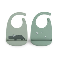 Done by Deer Croco Green silicone bib front view for mess-free mealtimes.