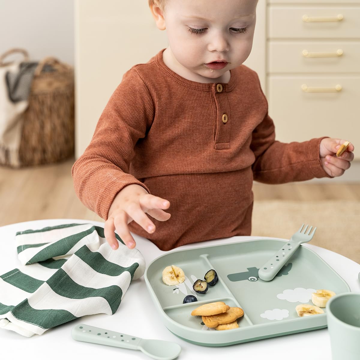 Done by Deer Foodie Croco plate green demonstrates microwave safety for quick meals.