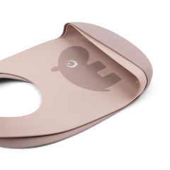 Dishwasher-safe Done by Deer Ozzo powder silicone bib ready for easy wipe-clean maintenance.