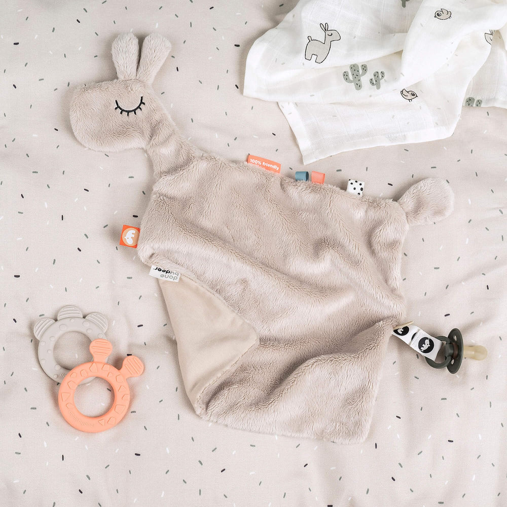 Done by Deer sand color complements nursery décor while remaining versatile for play.