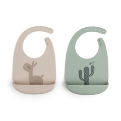 Done by Deer silicone bib with Lalee in sand color, keeps mealtime tidy with a large pocket.