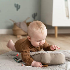Done by Deer tummy time pillow in use supports neck and back movement