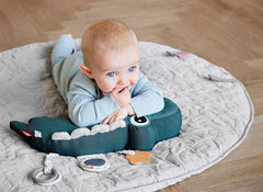 Done by Deer tummy time pillow mirror in-use promotes self-awareness during play.