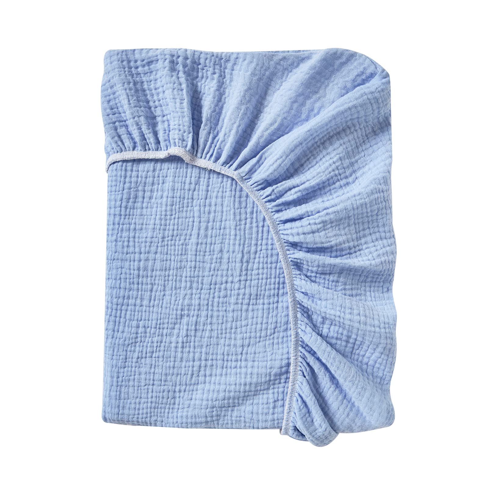 Donomilo changing pad cover on changing table demonstrates full coverage and soft fabric
