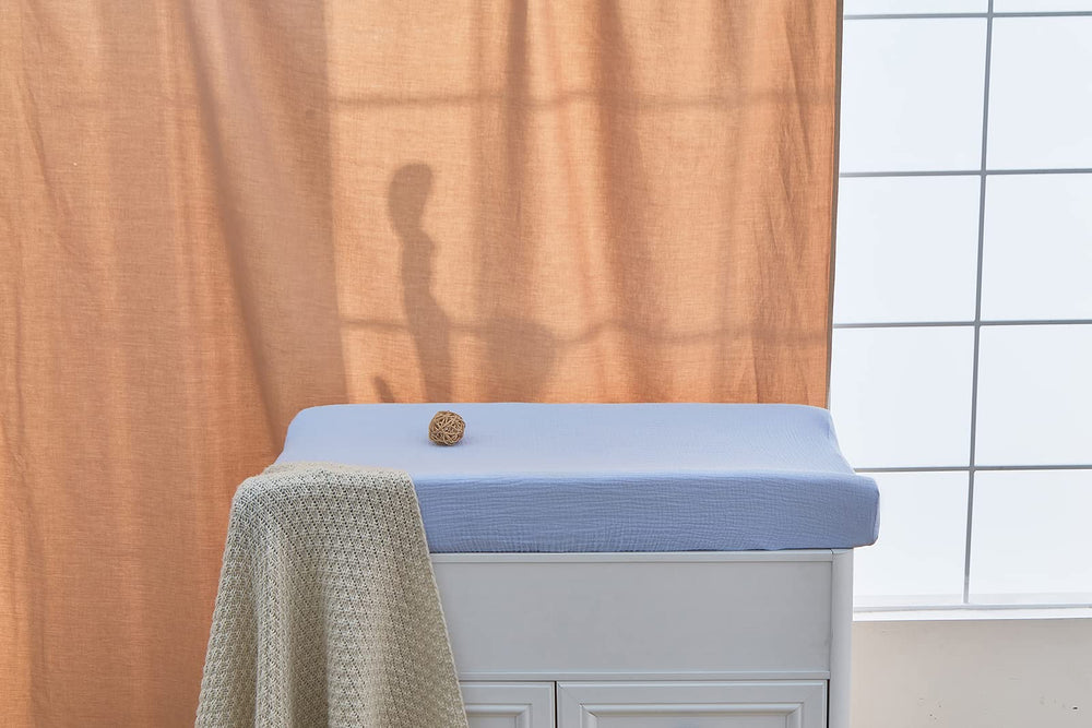 Donomilo nursery-ready changing pad cover offers cozy comfort during diapering
