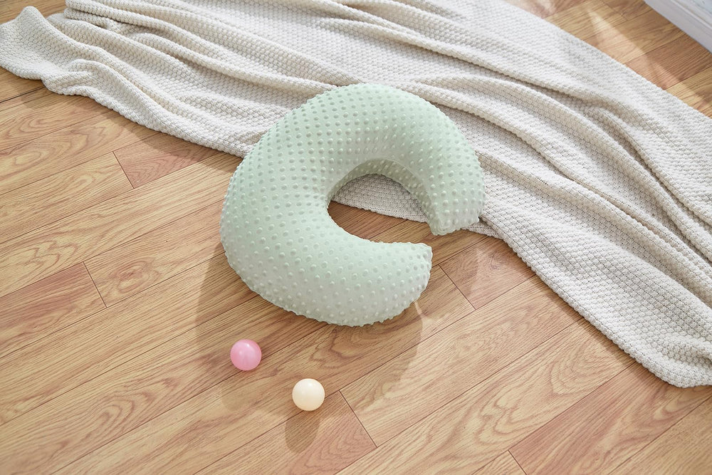 DONOMILO nursing pillow tummy-time setup provides gentle head and neck support.