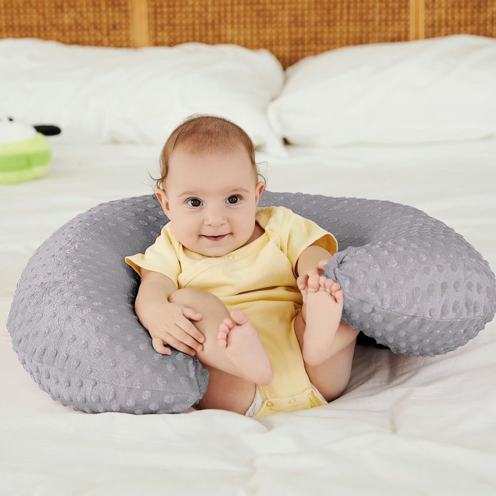 DONOMILO nursing pillow supports feeding, propping, tummy time, and sitting