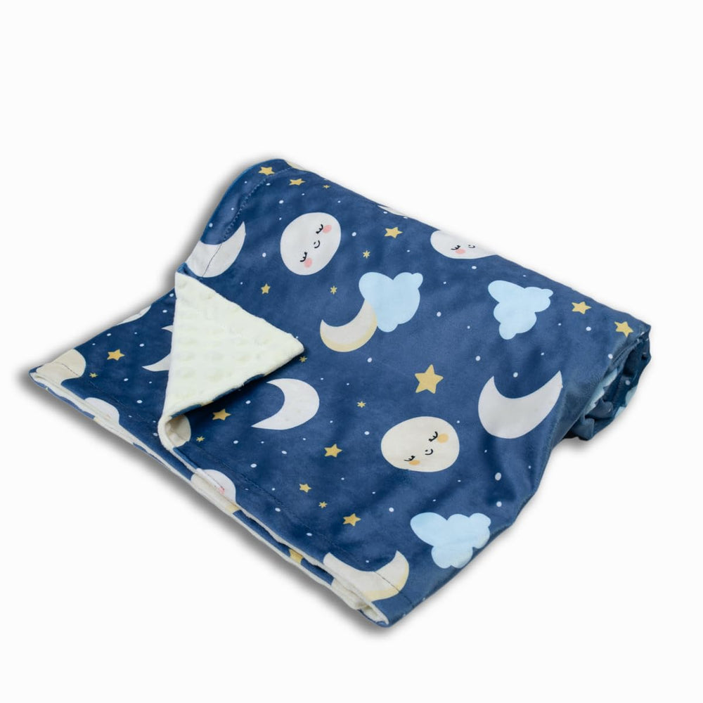 Donsonny Night Sky blanket beside crib, ideal for travel and naps.