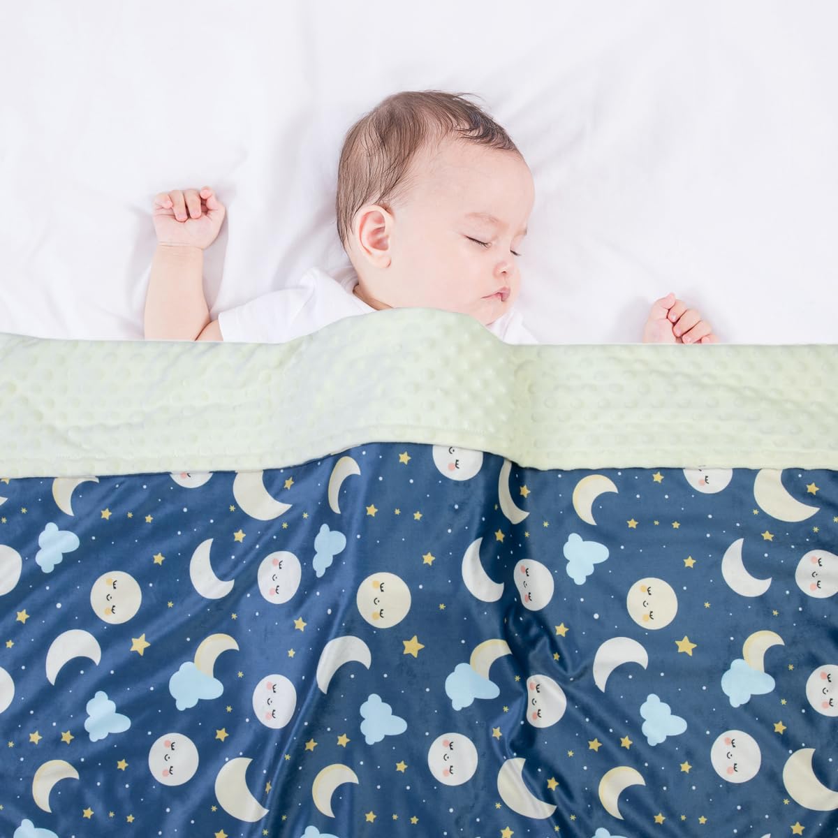 Donsonny reversible blanket featuring 3D-dotted side for tactile exploration.