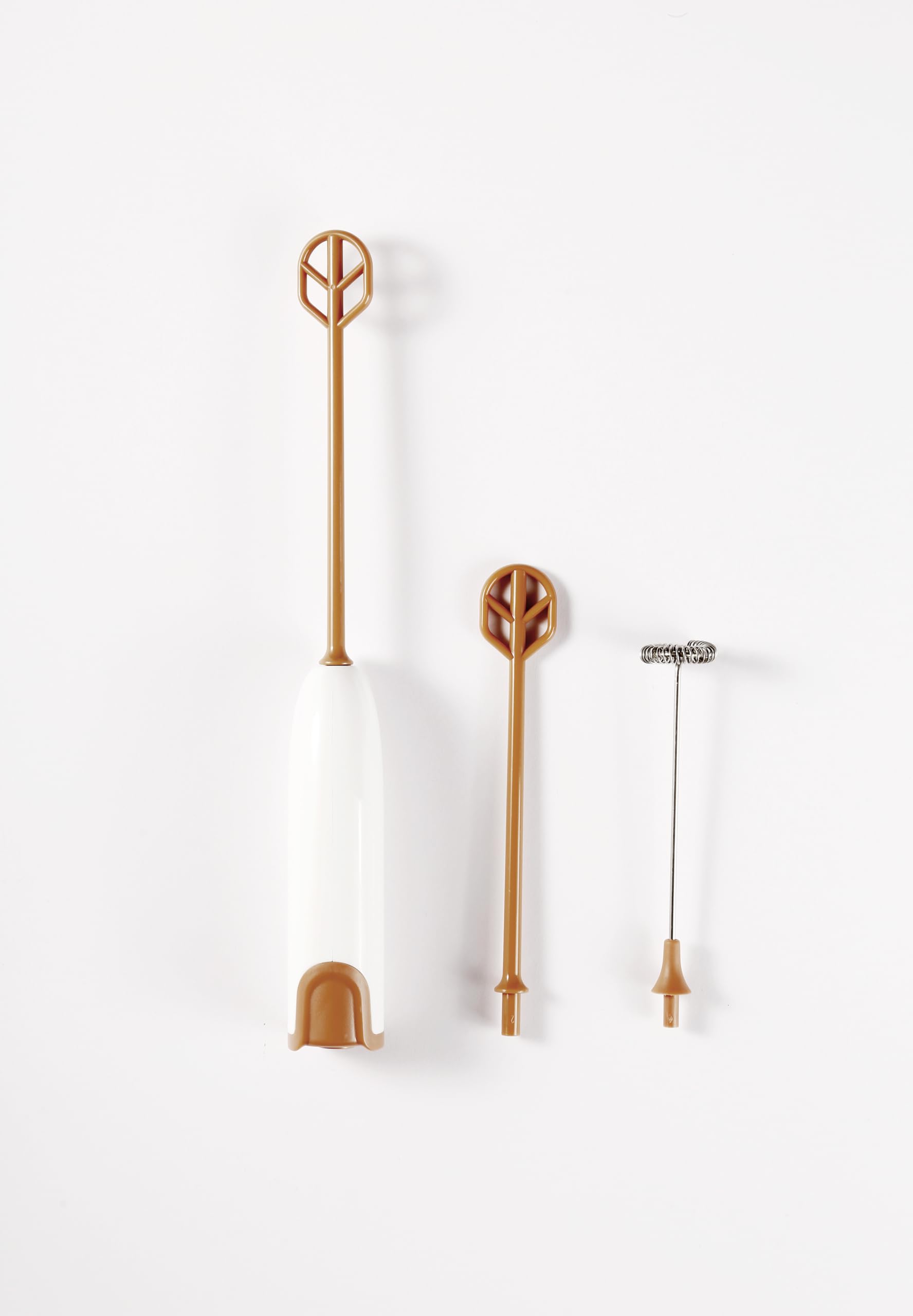 DOOBAANN formula mixer in-use with handheld grip for quick, bubble-free mixing.