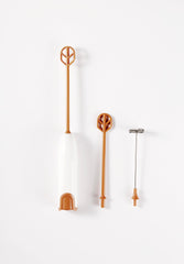 DOOBAANN formula mixer in-use with handheld grip for quick, bubble-free mixing.