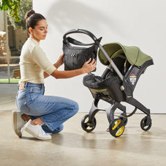 DOONA Essentials Bag Nitro Black includes changing mat for on-the-go diaper changes.
