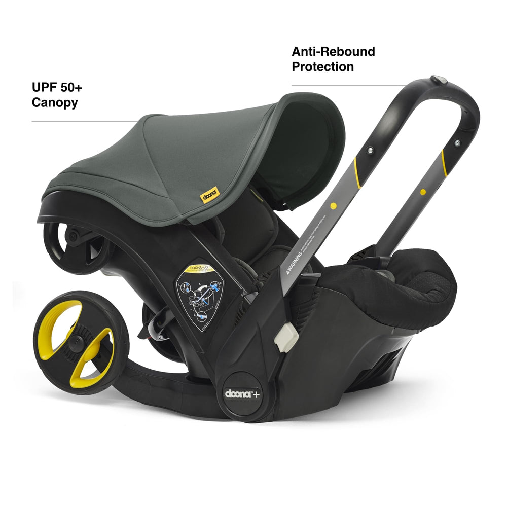 DOONA infant insert and head support maintaining newborn alignment