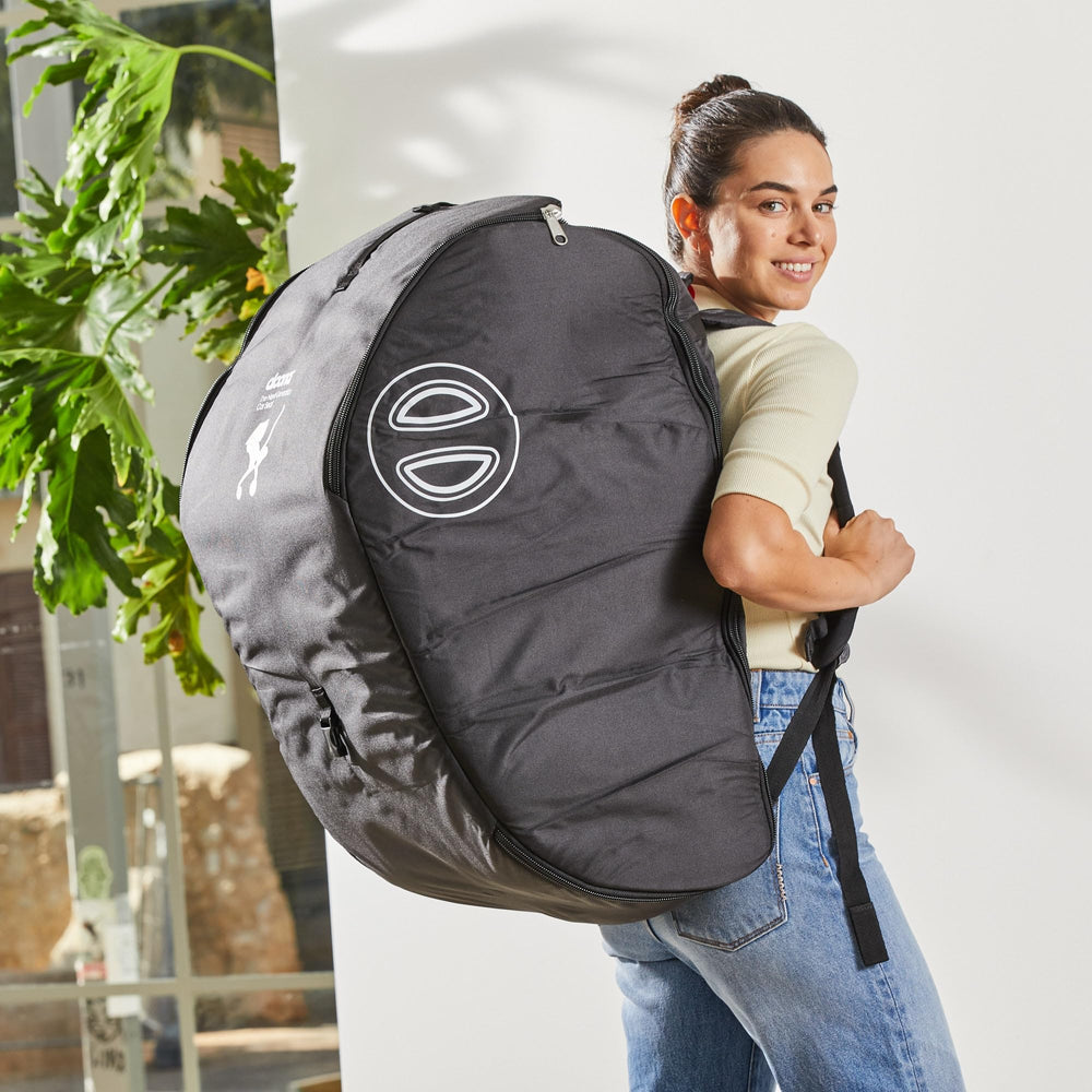 DOONA padded travel bag used at airport, guard against bumps.