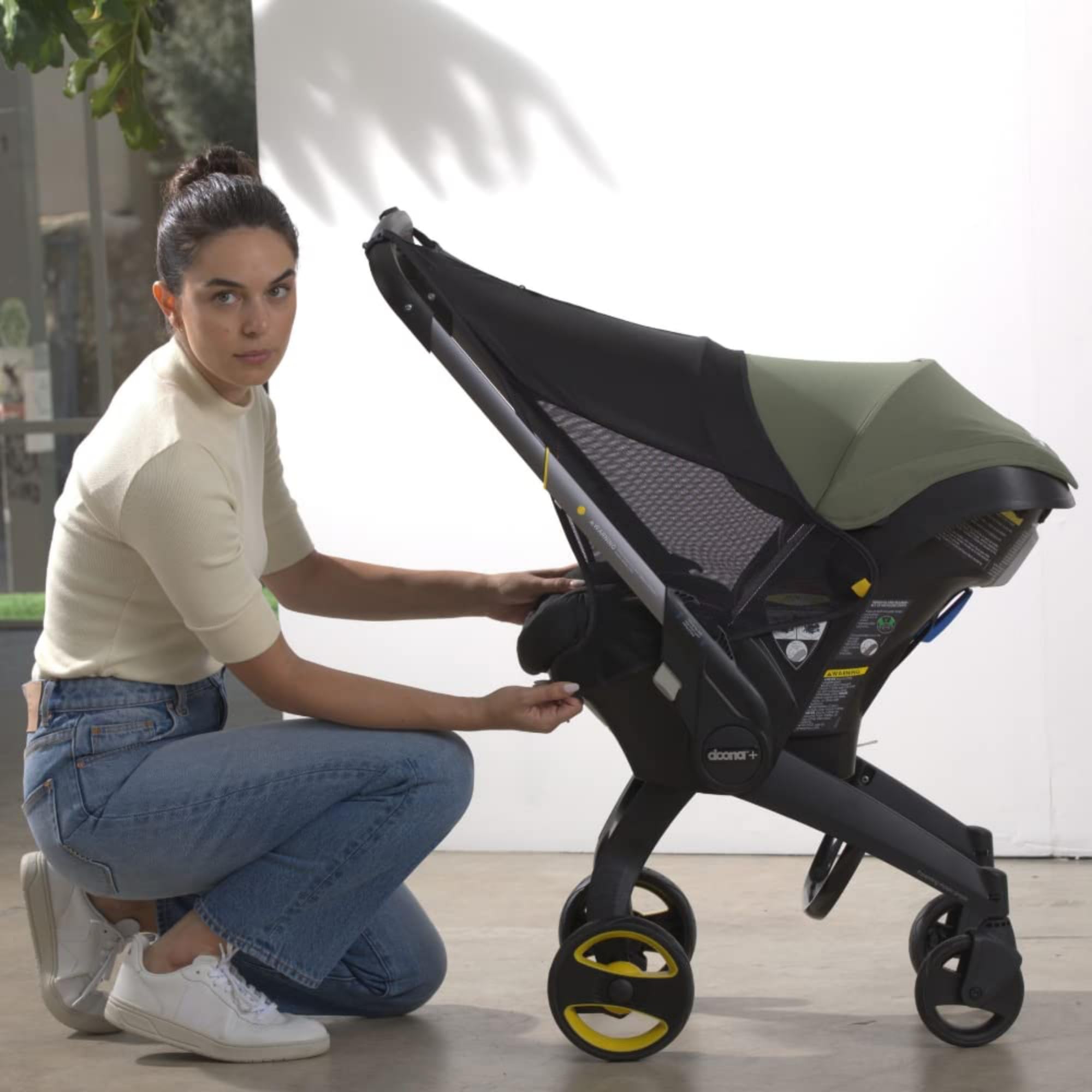 Doona Sunshade Extension demonstrates UPF 50+ sun protection in bright conditions.