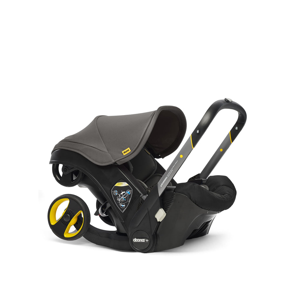 DOONA three-layer side-impact protection enhances safety during rides.