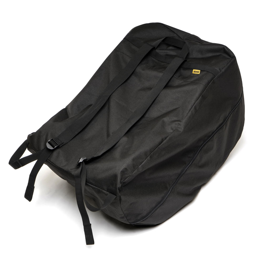 DOONA travel bag black folded with integrated pouch for compact storage