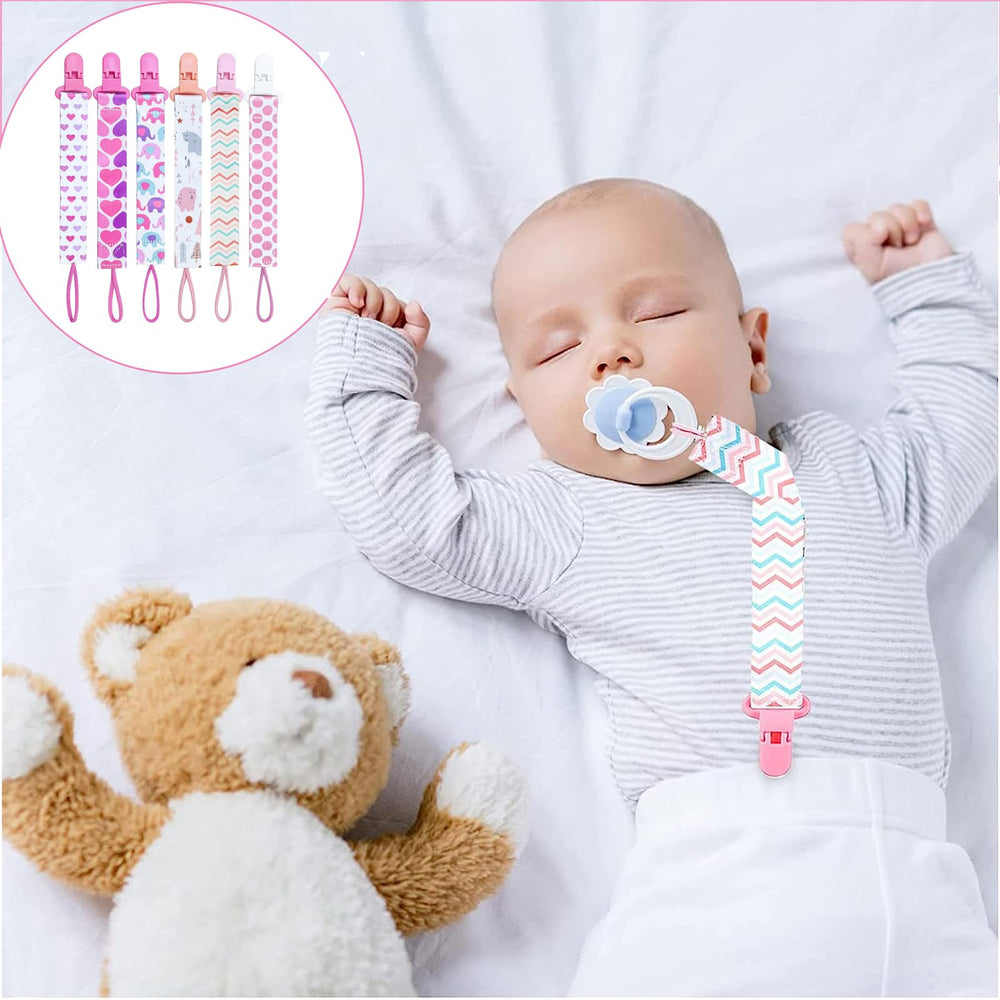 Dooyilets dummy clip striped design coordinates outfits and stays secure.