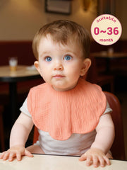 Dosmine bibs demonstrate adjustable snaps for comfortable neck fitting from newborn to 36 months.
