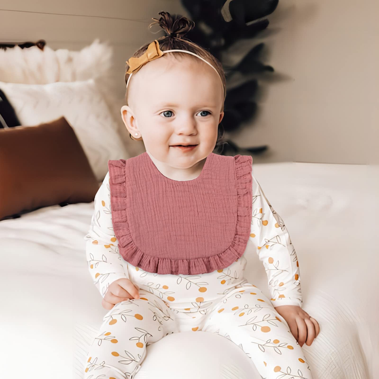DOSMINE muslin baby bib on-baby-wear demonstrates comfortable coverage during feedings and teething.