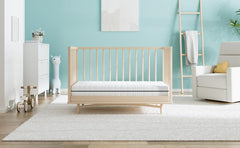 Dourxi infant-side firm foam supports healthy spinal alignment during naps
