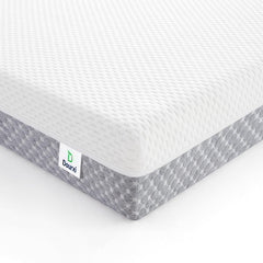 Dourxi mini crib mattress top view highlighting compact fit for portable cribs.