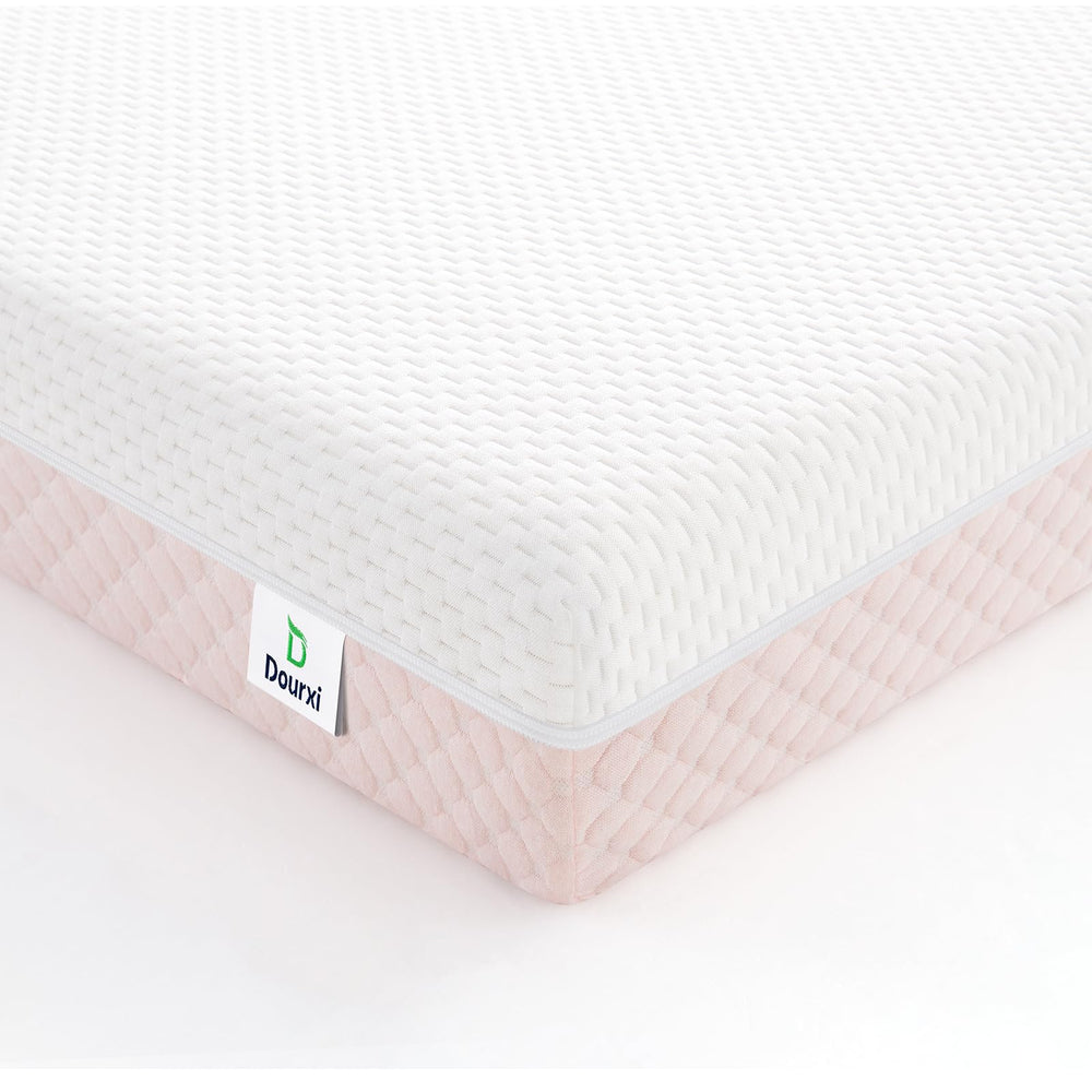 Dourxi mini-crib-mattress-38x24 image shows compact fit for portable cribs.