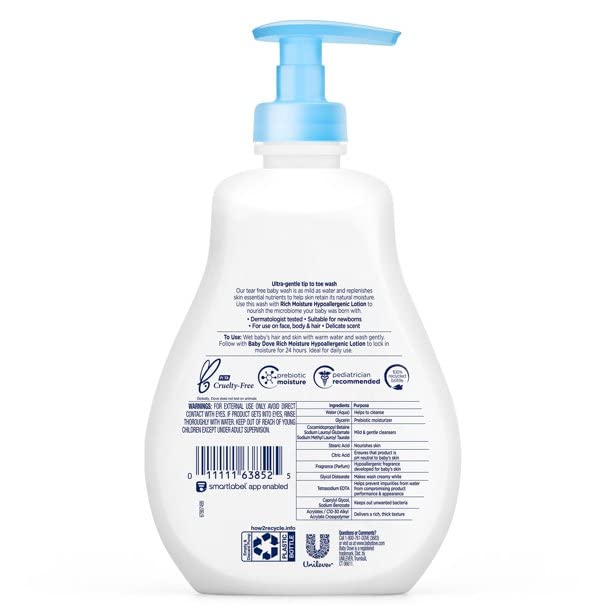 Dove Baby Tear Free Shampoo lather on baby hair demonstrates gentle cleansing.
