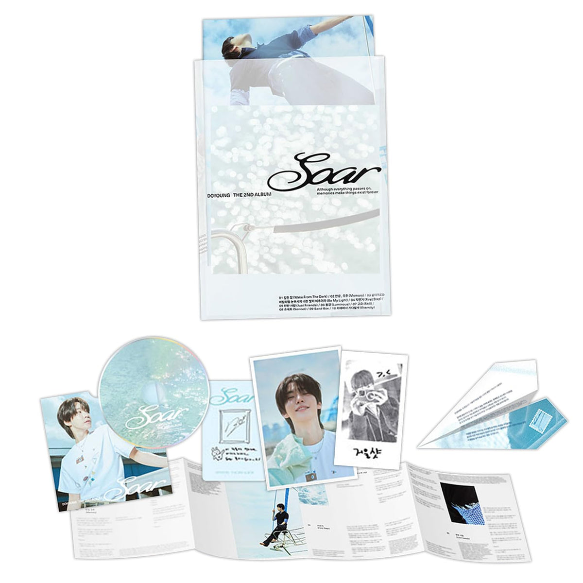 DOYOUNG 2nd Album Soar Be My Light photo book—collectible memorabilia for fans.