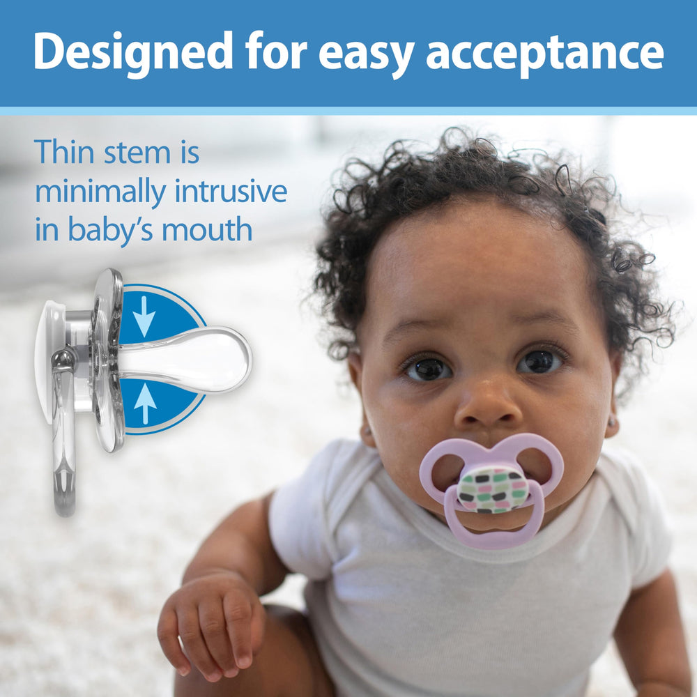 Dr. Brown's Advantage Glow pacifier closeup highlights soft silicone bulb for comfort.