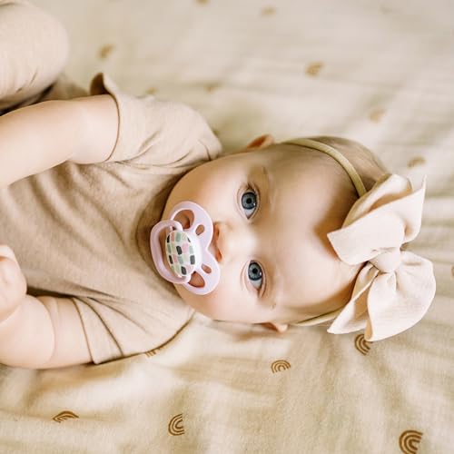 Dr Brown's Advantage pacifier supporting bedtime calm during use.