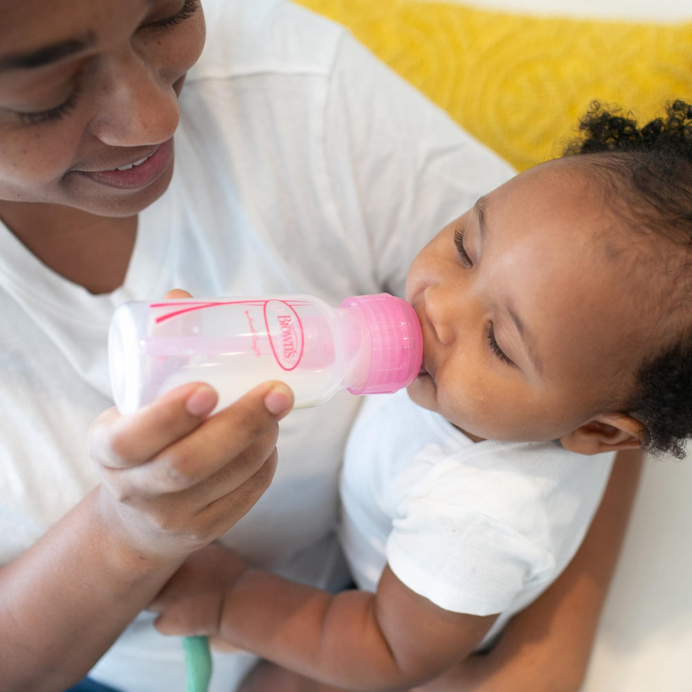 Dr. Brown's breast-like bottle shape close-up supports natural latch during feeding.