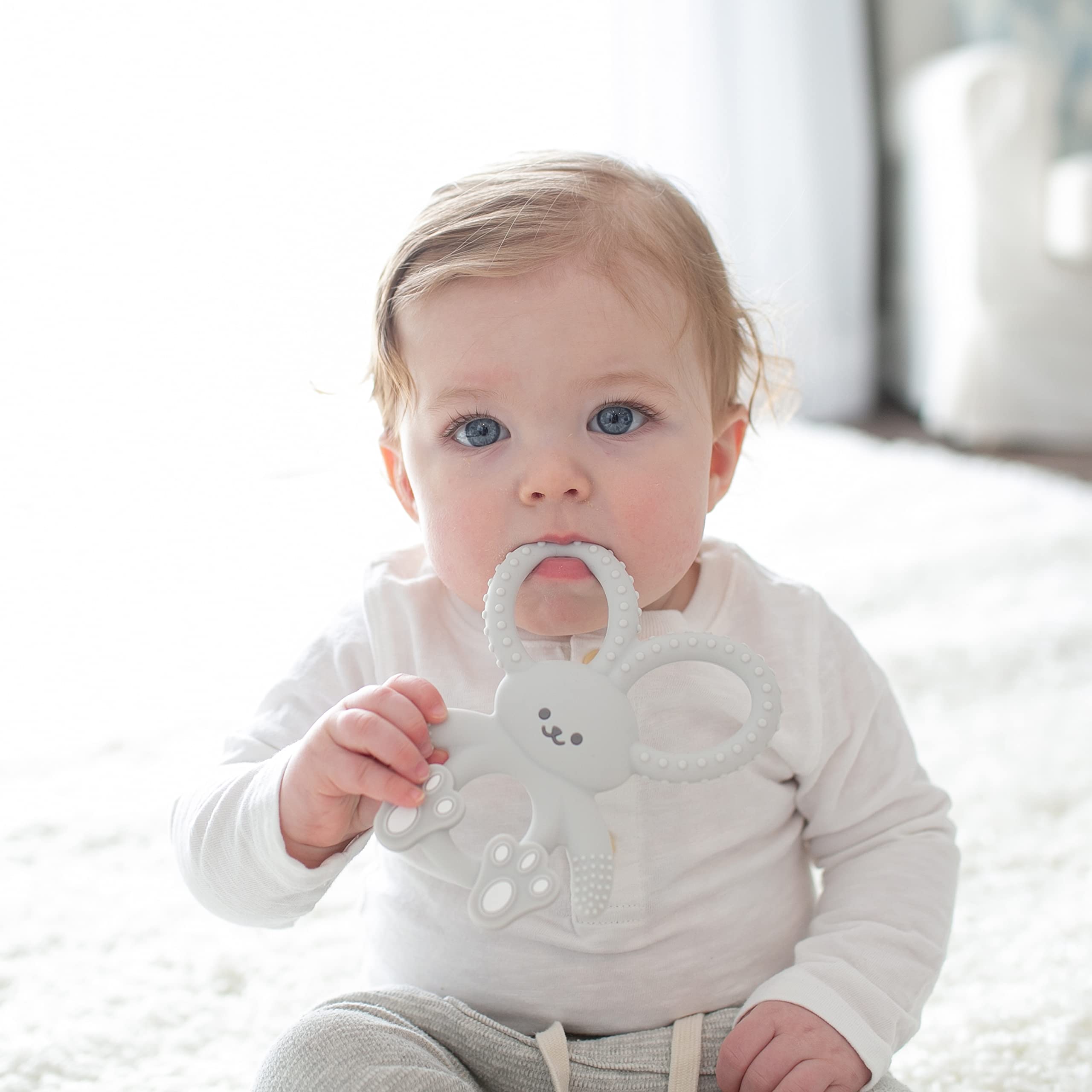 Dr. Brown's Flexees Bunny Teether gray ears bend to access hard-to-reach areas.