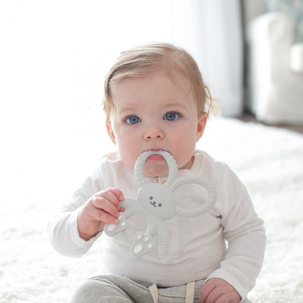 Dr. Brown's Flexees Bunny Teether gray ears bend to access hard-to-reach areas.