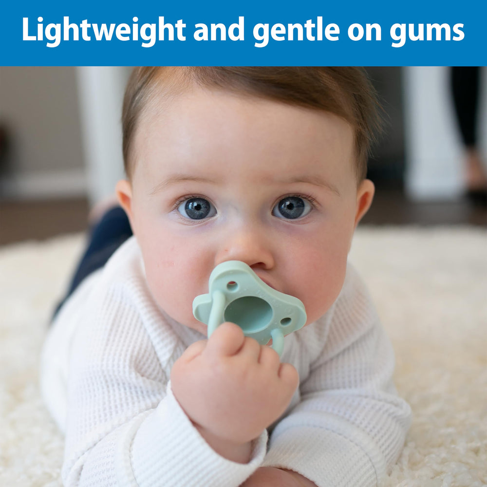 Dr. Brown's HappyPaci open-back design allows bonding while soothing fussy babies