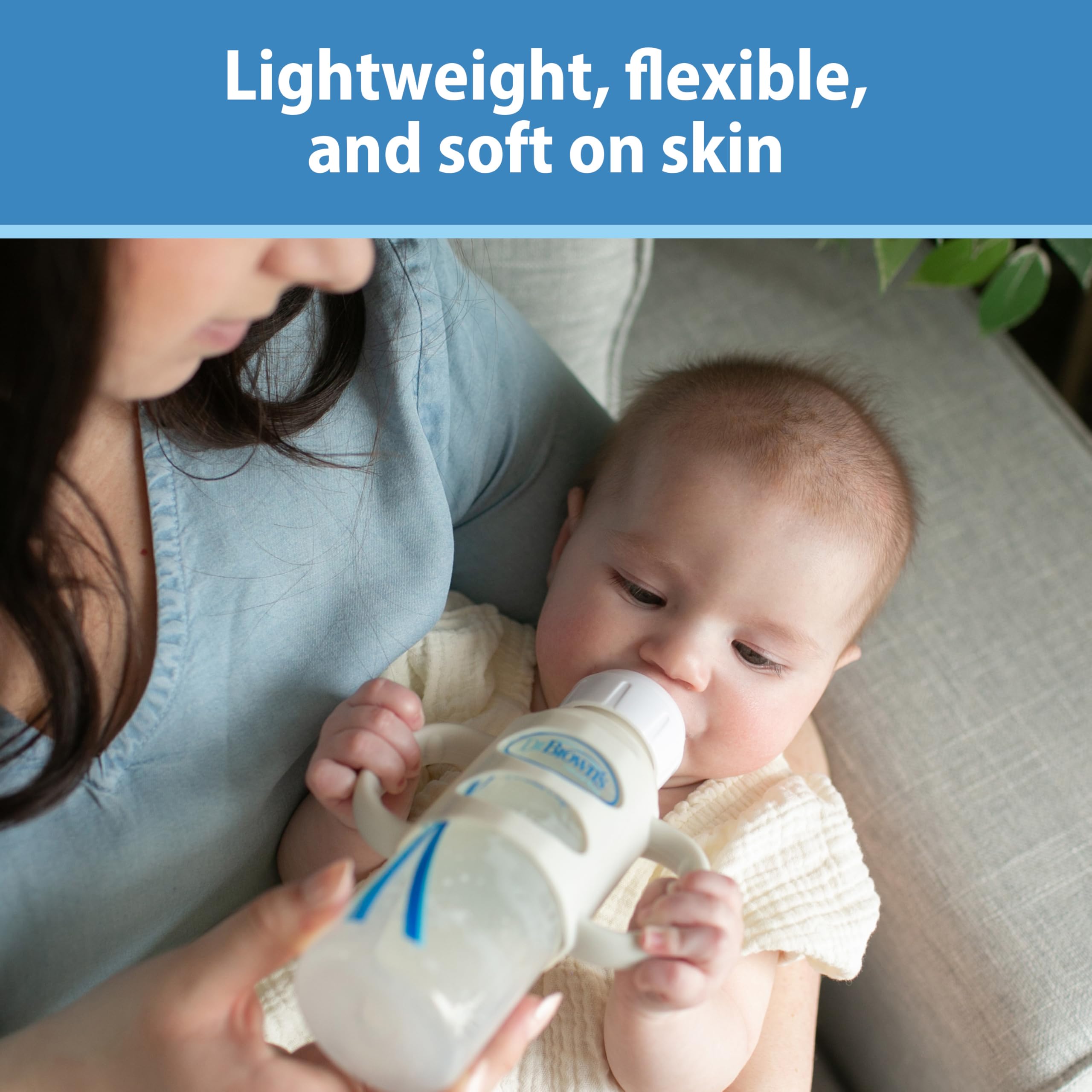 Dr. Brown's narrow bottle handles pink transition to sippy cup ready.