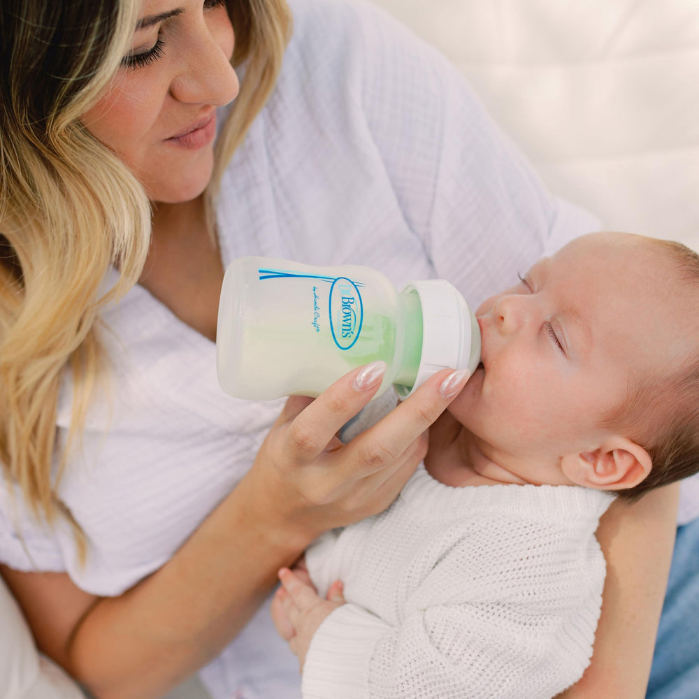 Night feeding with Dr. Brown's bottle for calmer evenings.