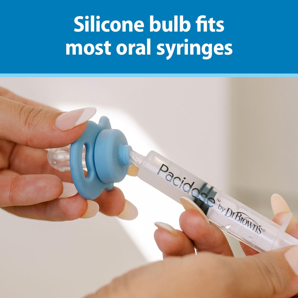 Baby ready for medicine with Pacidose during a calm caregiver session.