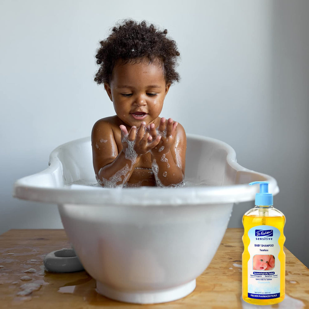 Dr. Fischer baby bath time scene; silky hair and light fragrance enhance comfort.