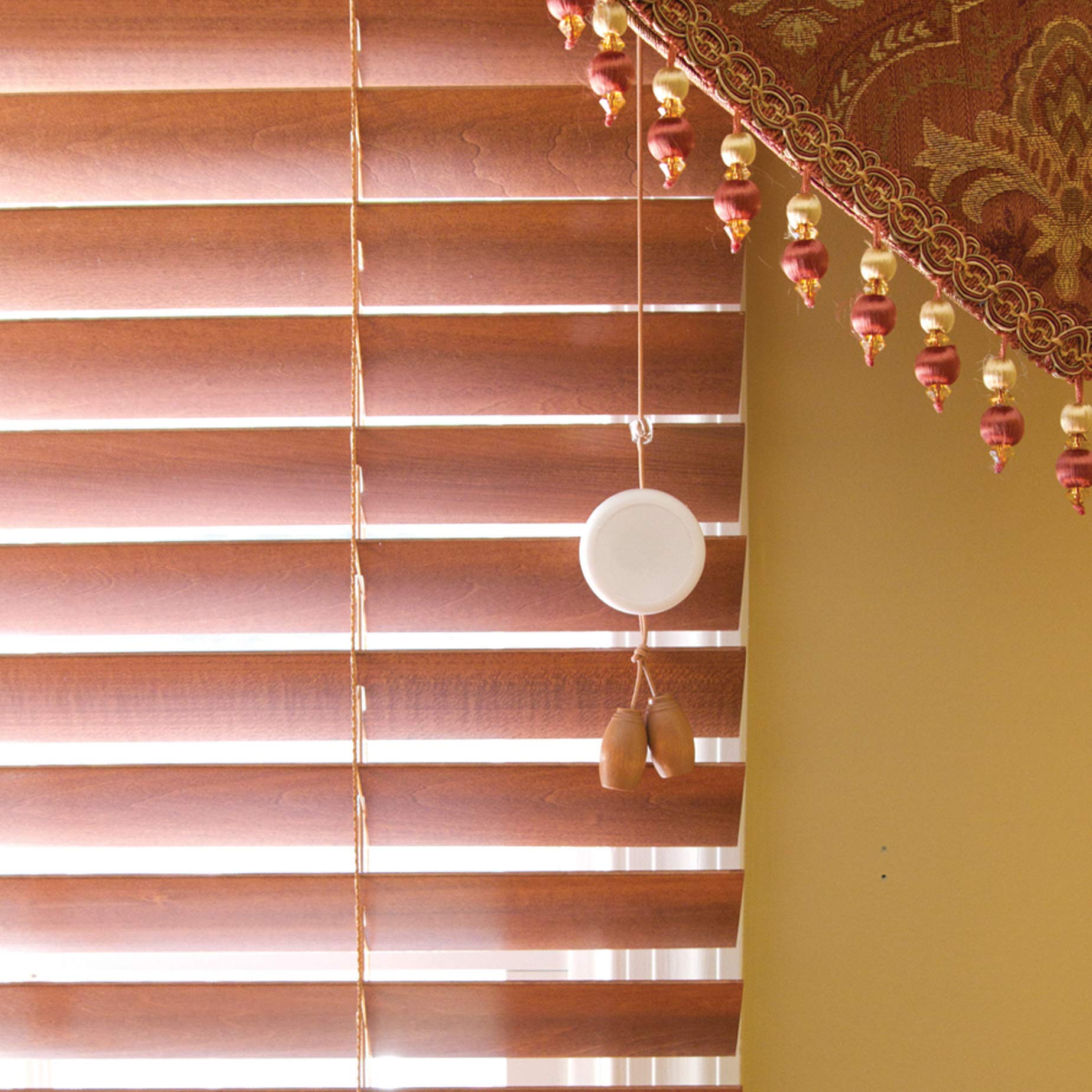 Dreambaby Blind Cord Wind-Ups in a child-safe living room scene.