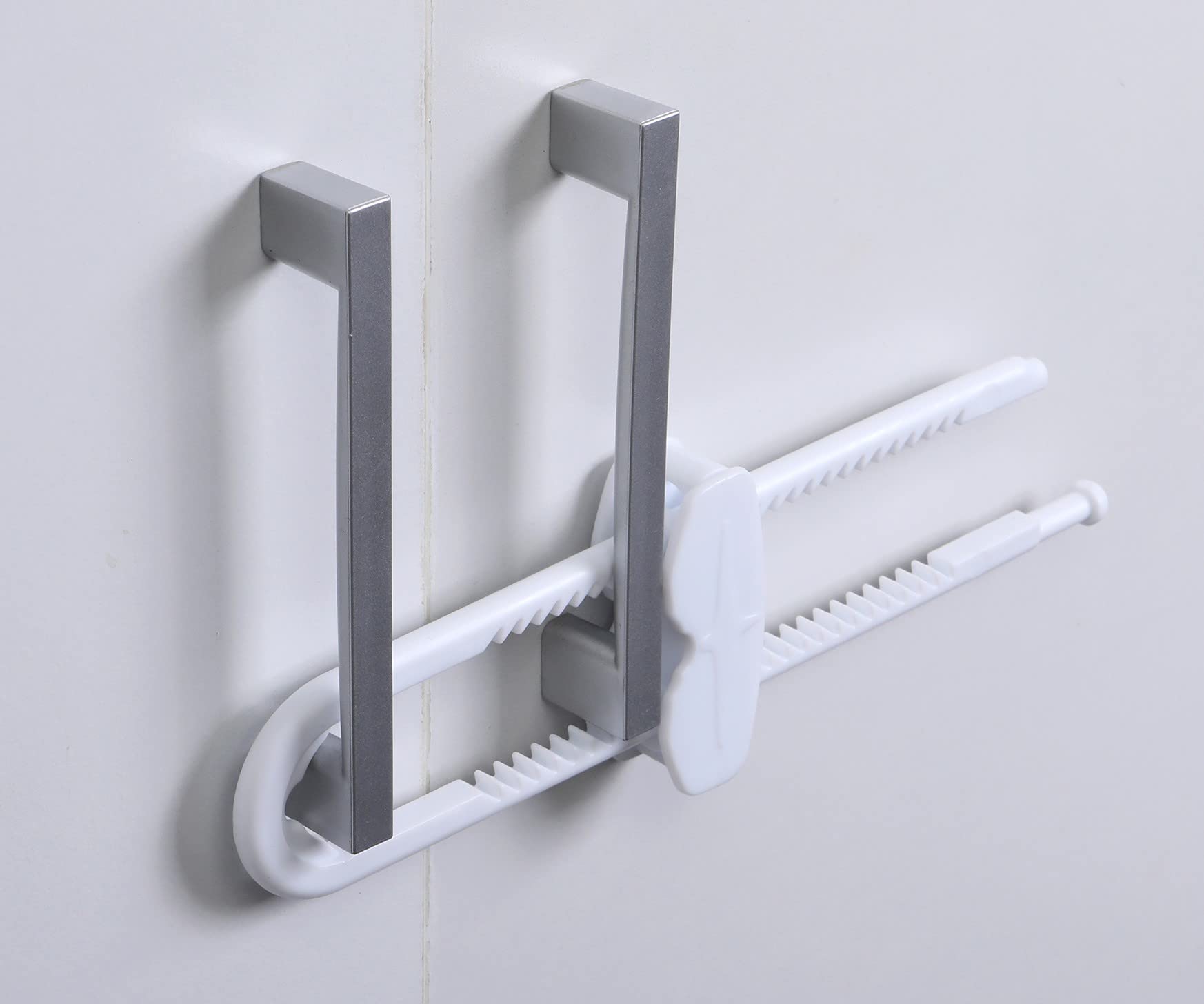 Dreambaby sliding locks in a kitchen pantry setup help keep contents safe and organized.