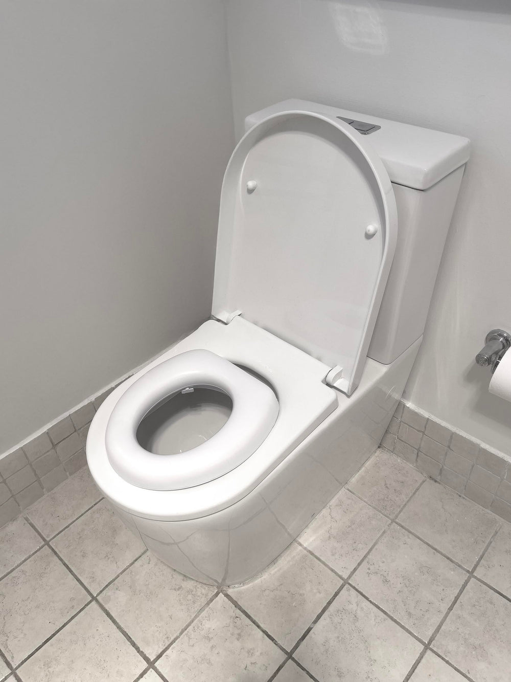 Dreambaby Soft Touch Potty Seat high-base inside design supports stability.