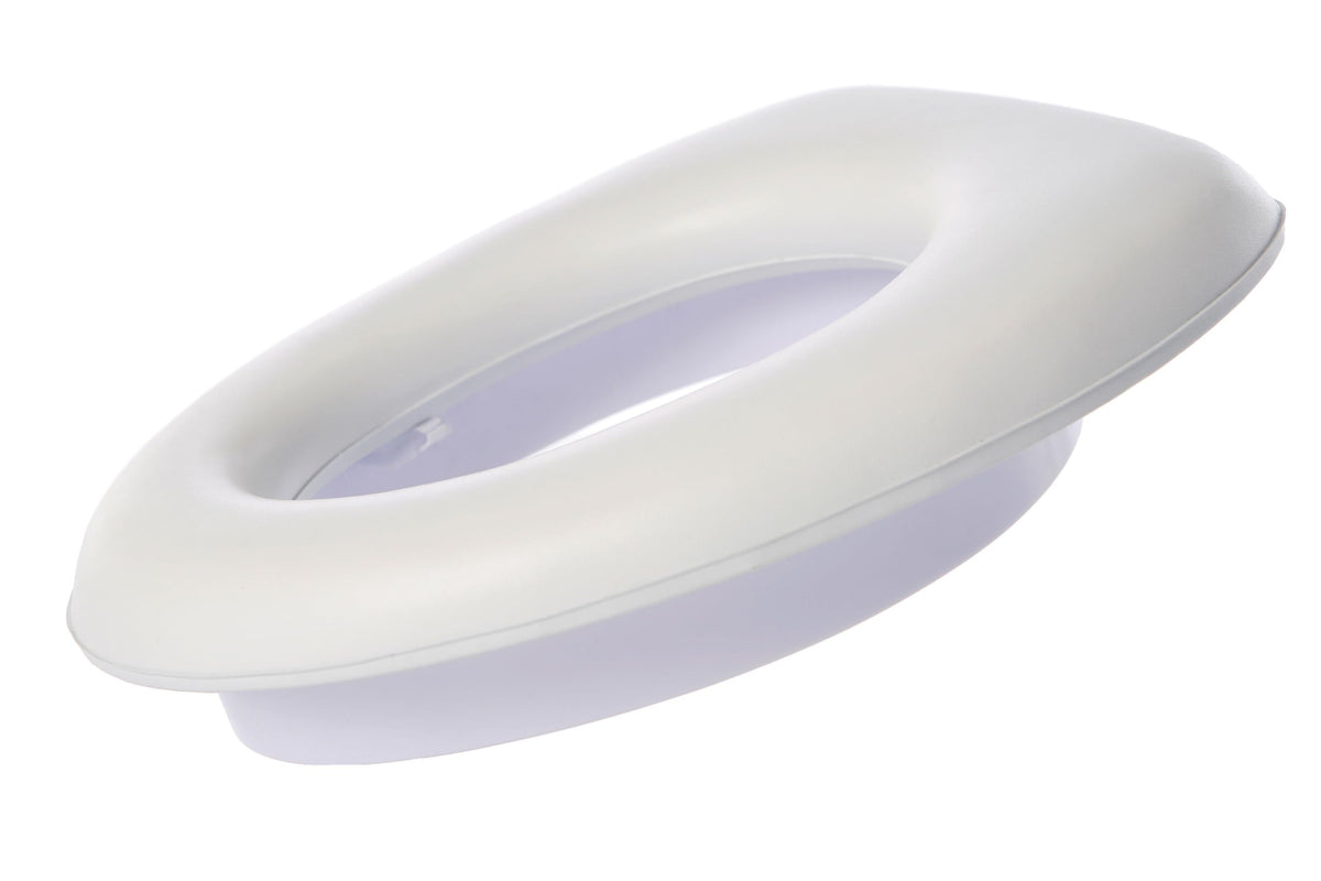 Dreambaby Soft Touch Potty Seat top view shows padded comfort for toddlers.