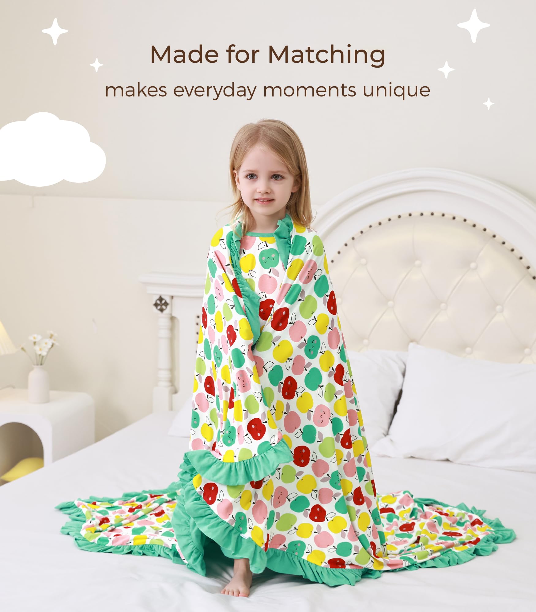 DREAMHALO Apple blanket in a cozy nursery scene with breathable fabric.