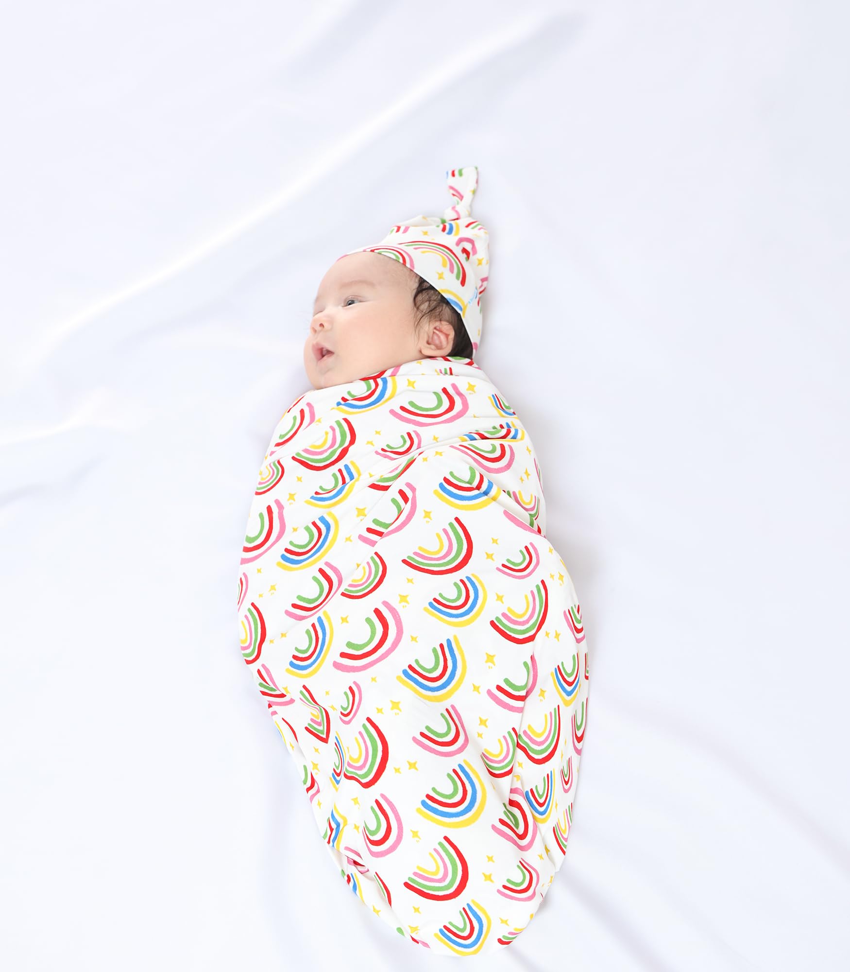 DREAMHALO sun design swaddle blanket set provides cozy sleep-ready softness.