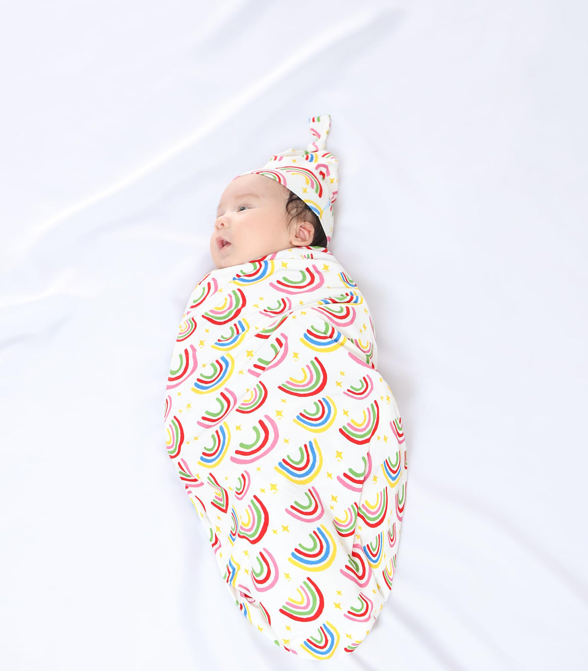 DREAMHALO sun design swaddle blanket set provides cozy sleep-ready softness.