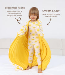 DREAMHALO nursery crib blanket setup shows a large 50x50 blanket in sun color.