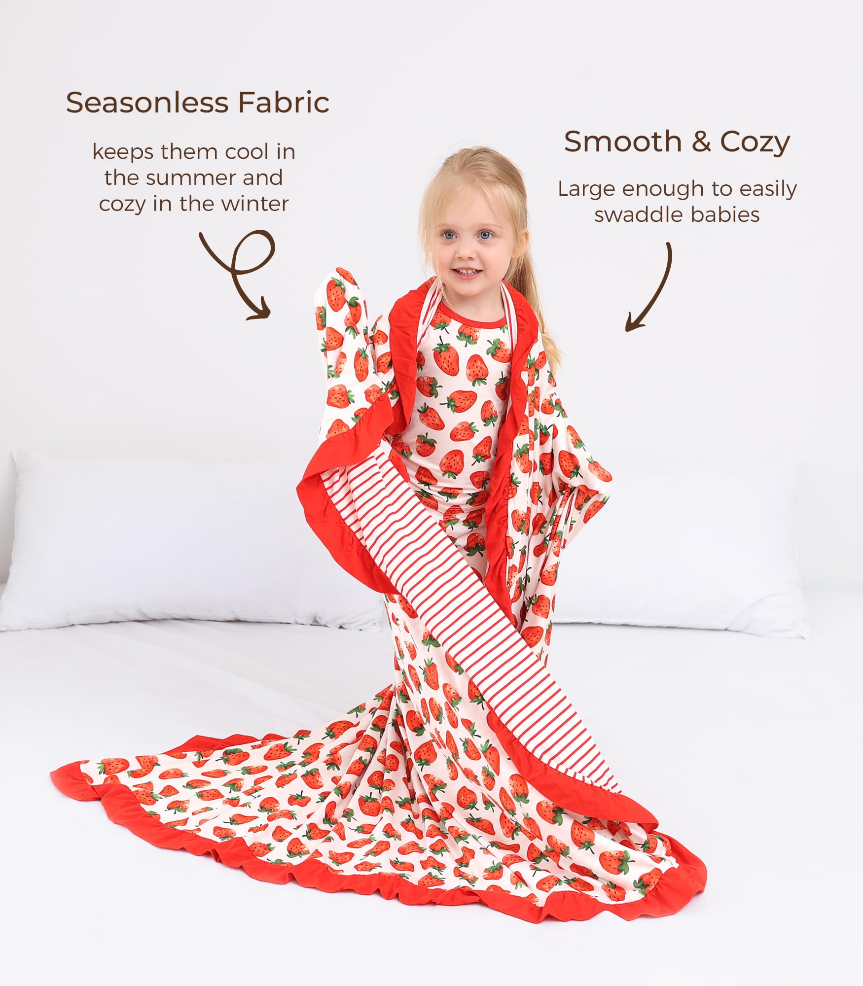 DREAMHALO Strawberry blanket swaddle image illustrates versatile use as swaddle or nursing wrap