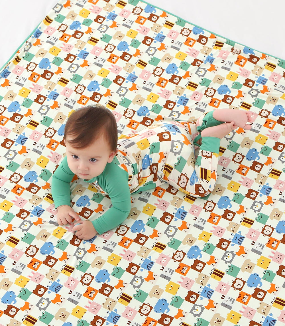 DREAMHALO toddler use shows soft, cuddly blanket for playtime and nap time.