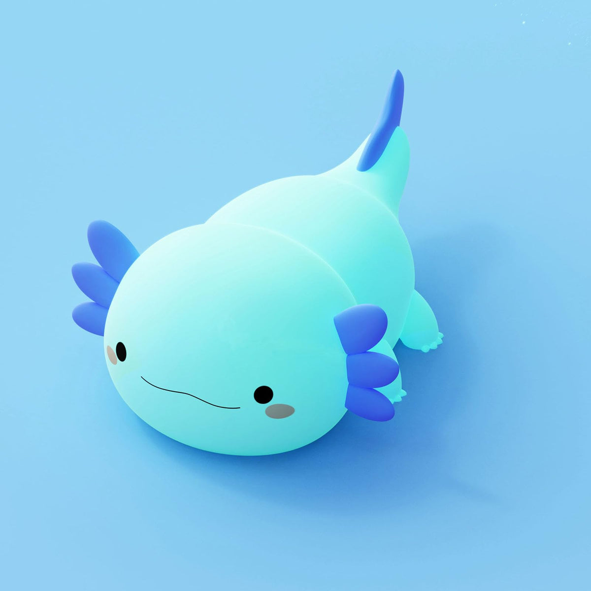 DREAMING MY DREAM Axolotl night light on bedside table with gentle, eye-friendly illumination.